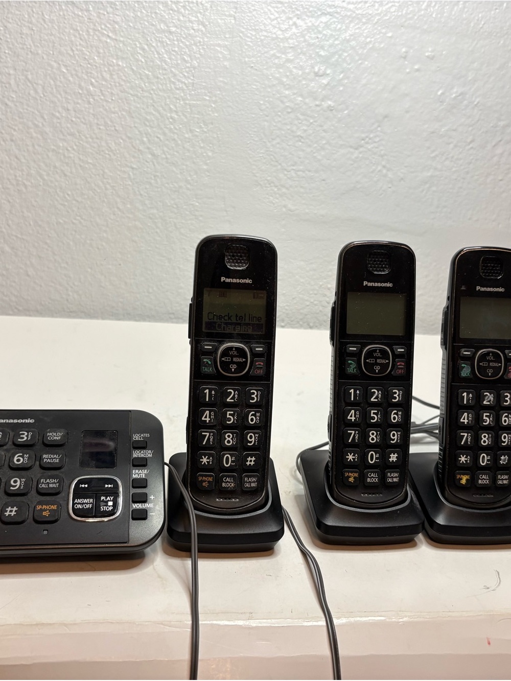Panasonic Black Cordless Phone Set with Three Handsets and Base